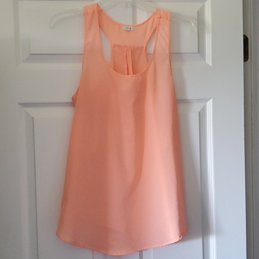 Tunic style semi sheer top